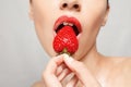 Woman Eating Strawberry Royalty Free Stock Photo