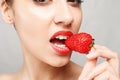 Woman Eating Strawberry Royalty Free Stock Photo