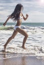 Woman Girl in Bikini Running on Beach Royalty Free Stock Photo