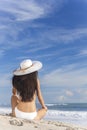 Woman Girl Sitting Sun Hat & Bikini on Beach Royalty Free Stock Photo