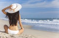 Woman Girl Sitting Sun Hat & Bikini on Beach Royalty Free Stock Photo