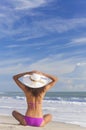 Woman Girl Sitting Sun Hat & Bikini on Beach Royalty Free Stock Photo