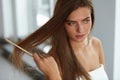 Woman With Haircomb In Hand Hairbrushing. Hair Health Royalty Free Stock Photo