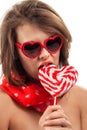 woman with heart shaped lollipop Royalty Free Stock Photo