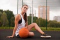 Woman Holding Basketball In Hand