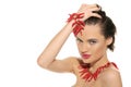 woman with jewelry of red hot pepper