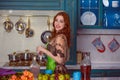 Woman in elegant style on vintage luxury kitchen interior Royalty Free Stock Photo