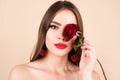 Sexy woman lips with red lipstick and beautiful red rose. Beautiful young pretty woman with healthy skin and red rose Royalty Free Stock Photo