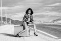 woman long legs suitcase open road Royalty Free Stock Photo