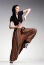 woman model posing in large (salwar) pants - fashion shot