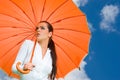 woman and orange umbrella Royalty Free Stock Photo
