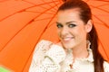 woman and orange umbrella Royalty Free Stock Photo