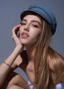 Sexy woman posing in cap fashion hat. Beautiful sexy model. Beauty woman face. Attractive sensual girl. Beautiful sexy Royalty Free Stock Photo