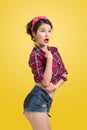 woman retro portrait with pin-up make-up and hairstyle pos Royalty Free Stock Photo