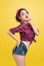 woman retro portrait with pin-up make-up and hairstyle pos Royalty Free Stock Photo