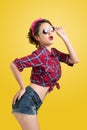 woman retro portrait with pin-up make-up and hairstyle pos Royalty Free Stock Photo