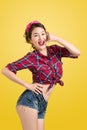 woman retro portrait with pin-up make-up and hairstyle pos Royalty Free Stock Photo