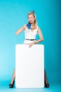 woman retro style with blank presentation board banner sign. Royalty Free Stock Photo