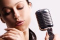 woman singing in retro mic Royalty Free Stock Photo