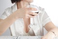 woman in white holding wine glass Royalty Free Stock Photo