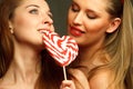 women with heart shaped lollipop Royalty Free Stock Photo