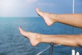 women's feet on the yacht