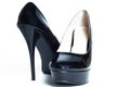 Sexy women's black high-heeled shoes. Isolated on a white background. Royalty Free Stock Photo