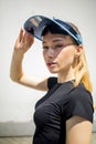Sexy young blonde woman, exercising in city outdoor, lifestyle portrait. Royalty Free Stock Photo