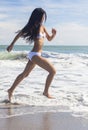 Woman Girl in Bikini Running on Beach Royalty Free Stock Photo