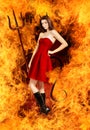 young brunette woman as devil in fire