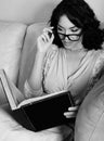 Young Brunette Woman Reading Book Royalty Free Stock Photo