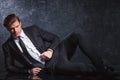 young fashion man lying down Royalty Free Stock Photo