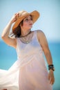 Young Girl posing at the beach near the sea Royalty Free Stock Photo