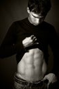 young man with muscular abdomen Royalty Free Stock Photo