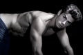 young man shirtless. Gym muscular body. Quadruped position. On all fours. Royalty Free Stock Photo