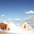 young red-haired girl on the beach. Royalty Free Stock Photo