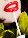 young woman applying red lip gloss / lipstick Royalty Free Stock Photo