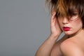young woman with red lips and messy hair Royalty Free Stock Photo