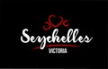 Seychelles country on black background with red love heart and its capital Victoria