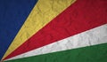 Seychelles flag with the effect of crumpled paper and grunge