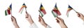 The Seychelles flag in hand in different angles on a white background Royalty Free Stock Photo