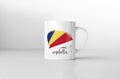Seychelles flag on white coffee mug. Royalty Free Stock Photo