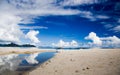 Seychelles island beach, blue sky, clouds, reflecting water surface, woman Royalty Free Stock Photo