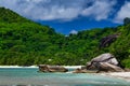 Seychelles Mahe Island - Baie Lazare beach, palm trees and granite rocks. Royalty Free Stock Photo