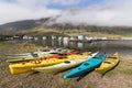 SEYDISFJORDUR, ICELAND - AUGUST 2018: waterfront view of old town timbered houses with plastic kayaks on foreground