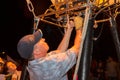 Hot Air Balloon Pilot Lighting His Burners