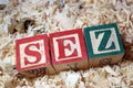 SEZ text on wooden block Royalty Free Stock Photo