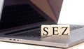 SEZ concept with wooden blocks on laptop keyboard Royalty Free Stock Photo