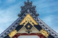 Sezonin temple colorful facade carved golden Dragon. Nagano City, Japan