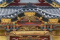 Sezonin temple colorful facade Shishi (Lion- Dog) and carved golden Dragon. Royalty Free Stock Photo